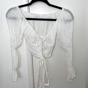 From a cute boutique in LA. Pilgrim white long sleeve drop top